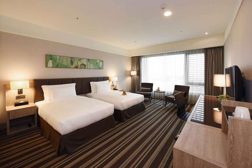 ฟูลลอน โฮเต็ล เถาหยวน แอร์พอร์ต แอคเซส เอ8 Hotel กุยซาน ห้อง รูปภาพ Deluxe Room